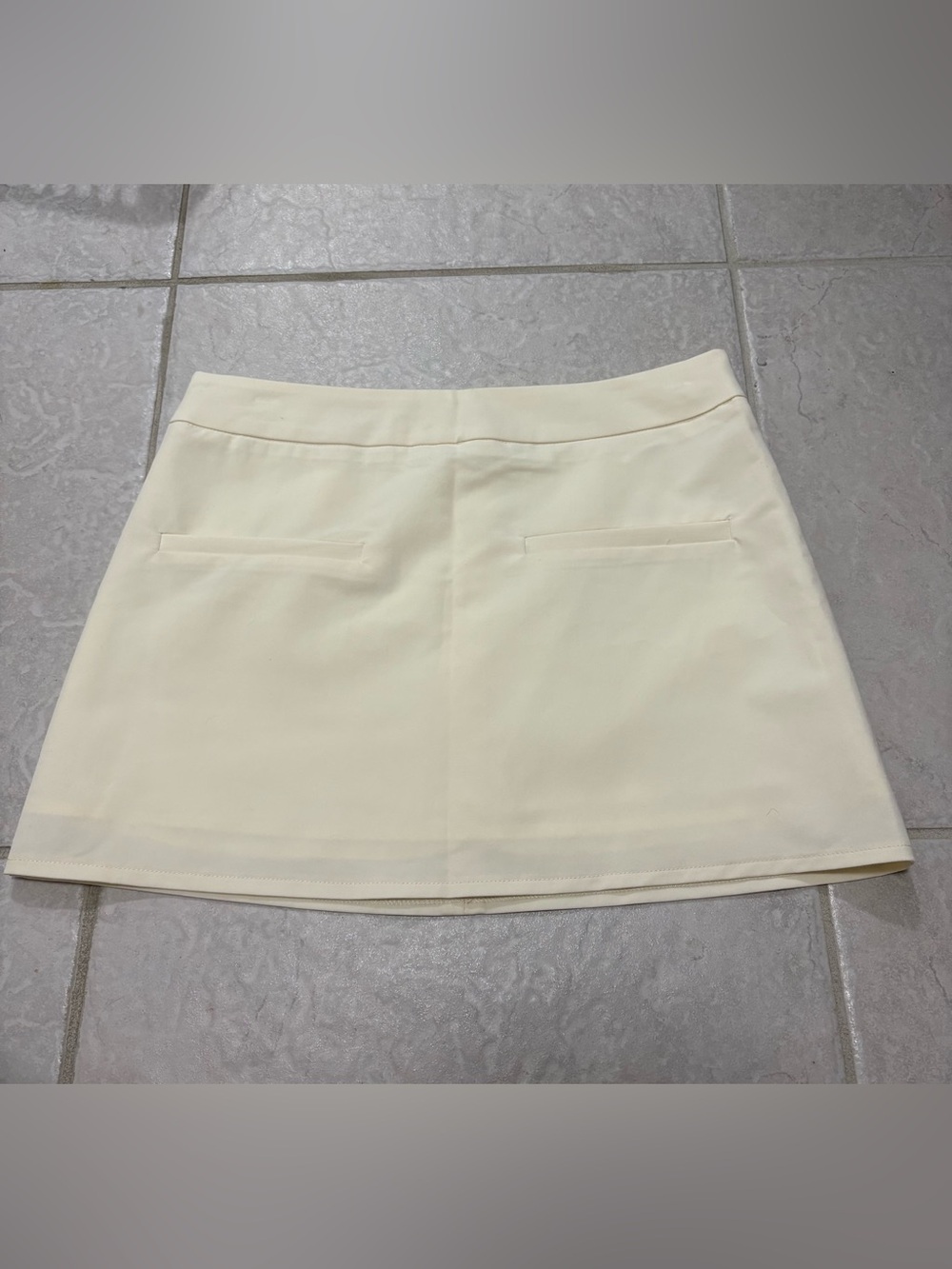 Peppermayo Pale Yellow Mini Skirt with Faux Pockets